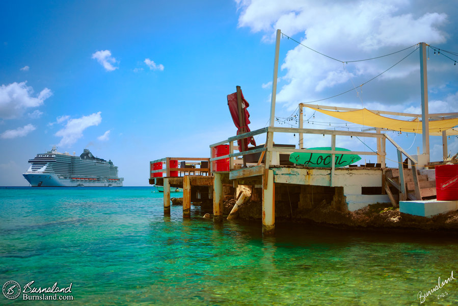 Peering at a pier in George Town, Grand Cayman, as seen during our 2022 Disney Cruise.